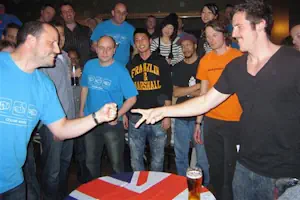 Two players competing in the UK 2010 Rock, Paper, Scissors competition